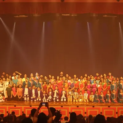 The grand finale of SparkLights, with all 120+ students and faculty gathered on stage at the Chowdaiah Memorial Hall. This image captures the immense scale and celebratory spirit of our annual showcase.