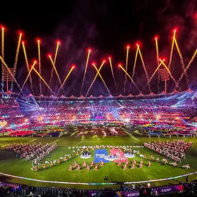 A bird's-eye view of the spectacle we created for the ICC Women's World Cup. This shot shows the full scale of our production, including the main stage, field performers, and the stadium-wide lighting and fireworks display we orchestrated.