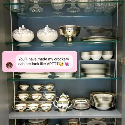 This client told us we made her crockery cabinet look like art, and that's exactly our goal. We use risers and careful stacking to create a display that is both beautiful and functional.