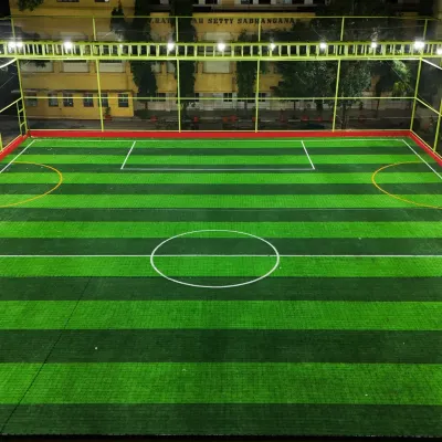 Our JP Nagar turf lit up and ready for an evening match. The high-quality artificial grass and clear markings provide a professional playing surface for football, box cricket, or even a game of frisbee.
