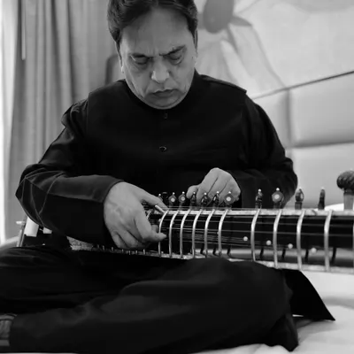 A black and white portrait of my beloved father and Ustad, Mohsin Ali Khan, tuning his sitar. Words will never be enough to express my gratitude for him.