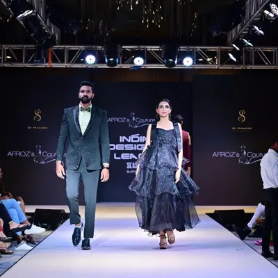 Models walking the runway at the Indian Designer League Season 5. This shot captures the professional staging and lighting I coordinate to create a premium runway environment.