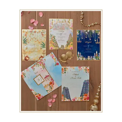 A riot of colors. We absolutely love the vibrancy of this invitation suite that we created to embody a truly South Indian spirit. The design features temple architecture, floral garlands, and a rich, celebratory color palette.