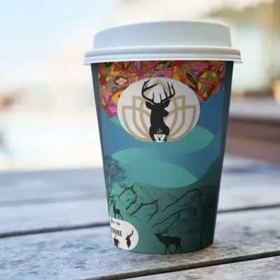 Here’s a concept for a coffee cup I designed. I wanted to give it a premium feel by mixing nature themes with colorful desi patterns. Seeing the design on a real cup like this helps you imagine how your own product could look.
