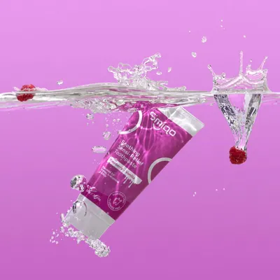 Making a splash with this toothpaste. We dropped the product and fresh raspberries into a water tank to create this dynamic underwater shot. Capturing the perfect splash takes precision and timing, but the result is a fresh and energetic image.