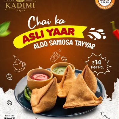 Chai ka asli yaar, our garma garam Aloo Samosa is ready. This classic tea-time snack is perfectly spiced and fried to a golden crisp.