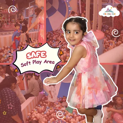 Our safe, soft play area is perfect for little ones to explore and have fun! This little girl is having a blast in our giant ball pit, a favorite spot for kids of all ages.