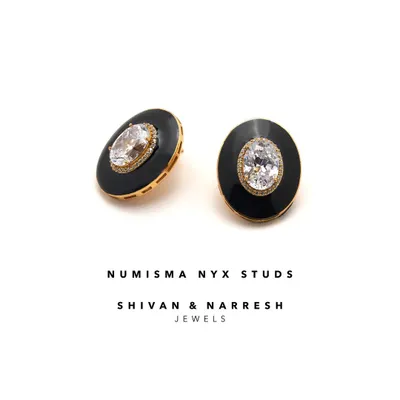 The Numisma Nyx Studs are understated yet unforgettable. These versatile studs, with their black enamel and central crystal, are a modern ode to minimal luxury, perfect for everyday wear or a special occasion.
