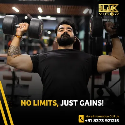 This is our philosophy: No Limits, Just Gains. A member demonstrates a powerful dumbbell shoulder press, embodying the mindset we encourage to push past barriers and achieve new levels of strength.