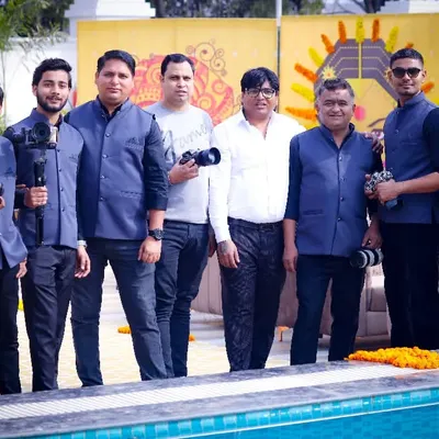Our dedicated team of photographers and videographers, ready to capture every moment of your special day.