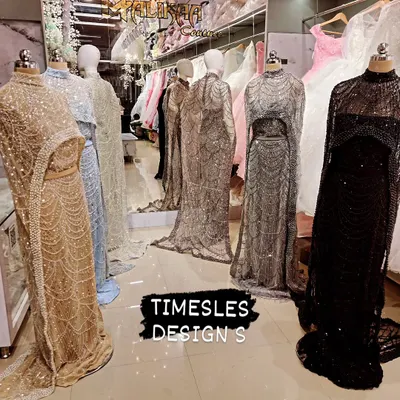 A lineup of my timeless cape designs. These fully embroidered gowns with attached capes are available in a range of stunning colors, blending heritage craftsmanship with modern style.