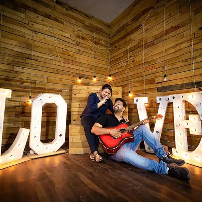 A fun and relaxed pre-wedding shoot in a studio setting. We offer versatile pre-wedding photography sessions, helping you get comfortable in front of the camera while capturing your personality as a couple before the big day.