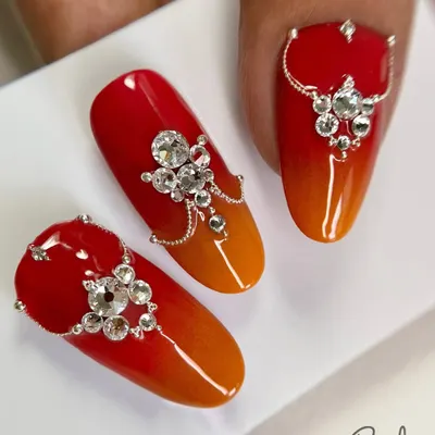 A full set of my fire-and-ice design, featuring a warm ombre base crowned with hand-placed Swarovski crystals. This is the ultimate statement for a bridal or festive look.