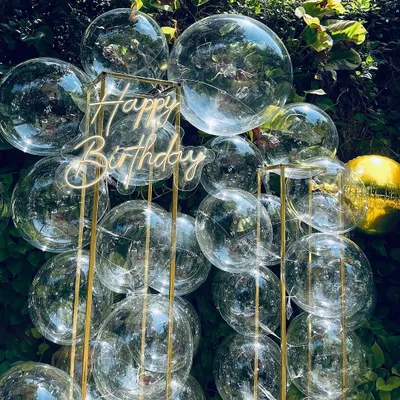 Our bubble backdrop is a truly unique and magical option for any celebration. The clear bubbles create a stunning visual effect, especially in an outdoor setting with natural light.