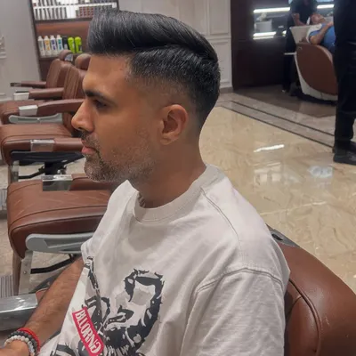 Walk in with style. A sharp, clean fade haircut that looks great from every angle.