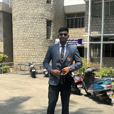 Standing outside the Sports Authority of India building, where I completed my Diploma in Sports Coaching. This certification is the foundation of my coaching methodology.