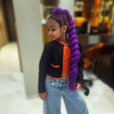 Our little star rocking a fierce purple "Demon Hunter" braid. I love creating fun and trendy hairstyles for kids too!