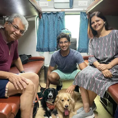 Relocating within India? I also arrange safe and comfortable pet travel by train. Here's a happy family with Gucci and Stocking in their own coupe on a journey from Howrah to Bengaluru, proving that no matter the distance, your family can always travel together.