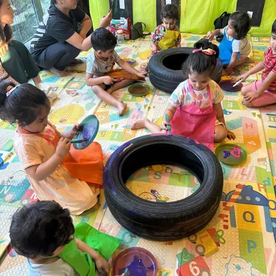 During Transport Week, we even painted with tires! The kids loved rolling toy tires in paint to create unique tracks and patterns on paper.