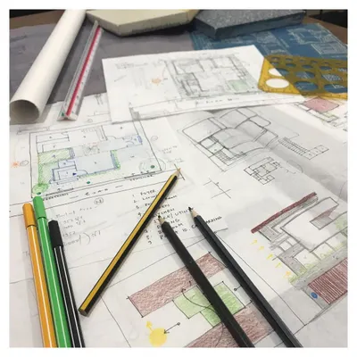 This is where every project begins: with layers of sketches, site plans, and brainstorming notes. My process is hands-on from the very first concept, focusing on spatial design and planning to create earth-friendly homes.