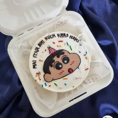 A cute Shinchan bento cake. These little lunchbox cakes are perfect for adding a personal and fun touch to any celebration.