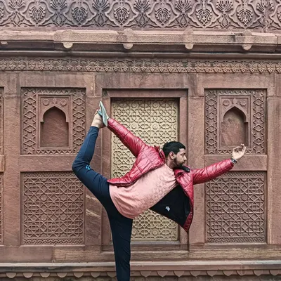 Striking a dancer pose at Agra Fort, even though they said yoga was not allowed. Sometimes you have to bend the rules.