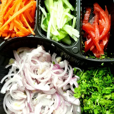 Freshness is essential for authentic flavor. I use freshly chopped vegetables like onions, carrots, cucumber, tomatoes, and cilantro for the salad and raita that accompany every biriyani order, ensuring a crisp and clean taste.