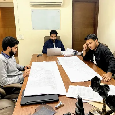 A typical Monday in the office, reviewing case files and blueprints with my team. Thorough preparation and collaborative strategy are the foundation of every case we handle, whether it's a construction dispute or a complex commercial matter.