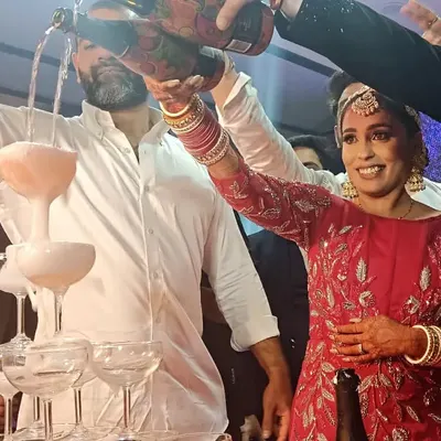 It's all about the celebration. We help create memorable moments like this champagne tower pour, a classic and elegant touch for any wedding reception or cocktail party.