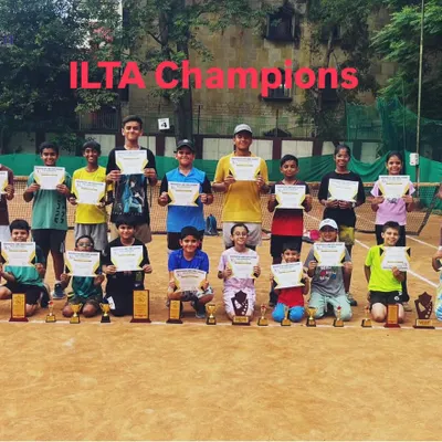 The spirit of ILTA. A huge group of our champions after the Summer Cup. This image captures the energy and scale of our tournaments, where dozens of players come to compete.