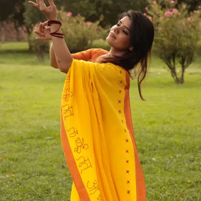 Shringaar. A moment of quiet expression in a beautiful yellow saree. The way an artist carries themselves, even in stillness, is a part of the dance.