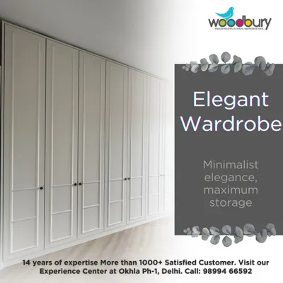 There is a timeless beauty in classic designs. This floor-to-ceiling hinged wardrobe in a clean white finish adds a sense of space and calm to the room. The panelled design gives it a touch of elegance, while the minimalist knobs keep the look modern and fresh.