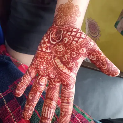This is a great example of the initial stain color. This bright reddish-orange is the first stage of the color journey, which will darken significantly over the next day or two.