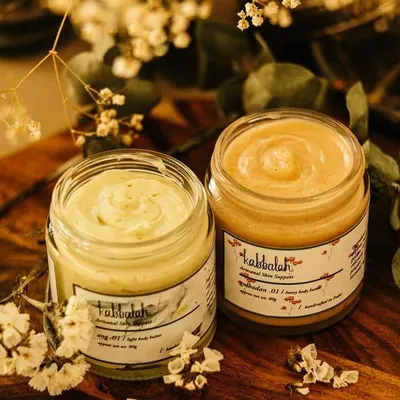 A look at two of my artisanal body butters. They are designed to soothe dry skin, reduce the appearance of stretch marks, and can even be used to calm freshly shaved skin.