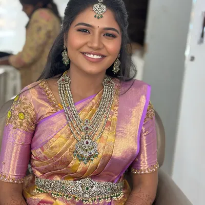 My beautiful bride Gopika looking radiant for her reception in Karur. We chose a subtle yet glowing makeup look to complement her lavender silk saree and stunning diamond jewellery.