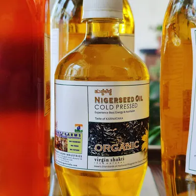 This bottle contains my organic, cold-pressed Nigerseed oil. The cold-press method ensures that the oil's energy and nutritional value remain intact, making it a healthy choice for your daily cooking needs.