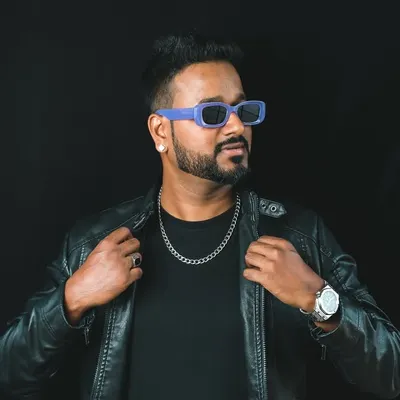 A professional and stylish look for a New Year's Eve promotional shoot. I believe in presenting a polished and confident image that reflects the quality of my service.