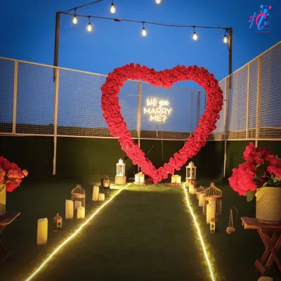 This is our most requested proposal setup, designed for maximum impact. The glowing pathway, lanterns, and massive rose heart create a breathtaking scene for asking the most important question of your life.