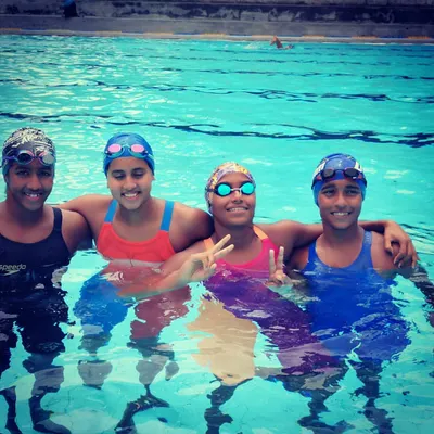 The smiles after a tough training session. My swimmers are not just competitors, they are a team that grows together in the pool.