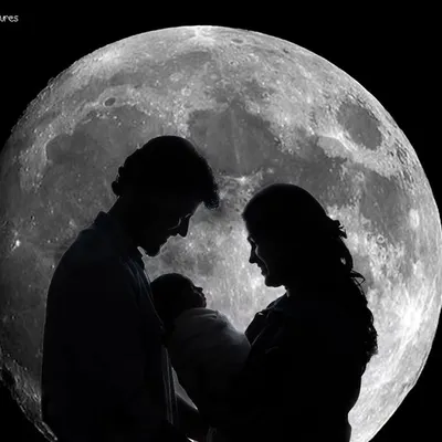 Another take on the moon silhouette concept, this time with a newborn. This artistic approach transforms a family portrait into a dramatic and memorable piece of art, symbolizing a new world revolving around the baby.