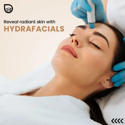 A client receiving a HydraFacial, a treatment designed to reveal radiant skin. The procedure is comfortable and focuses on deep cleansing and hydration, making it suitable for nearly all skin types.