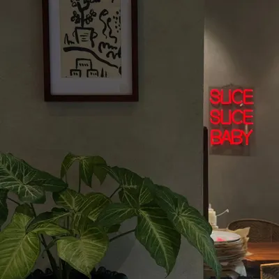 Weekends carry a different kind of stillness. My space, with its playful neon sign and lush plants, invites you to stay a little longer and taste without hurry.