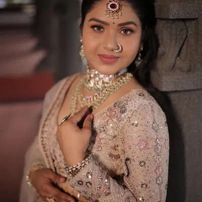 A close-up of this elegant light pink lehenga with silver embroidery. It's a perfect choice for a bridesmaid or for attending a wedding.