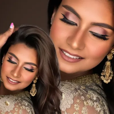 This is my signature bronze glam. I focus on creating a warm, sun-kissed glow with shimmering eyeshadows and a dewy skin finish that makes you look radiant.