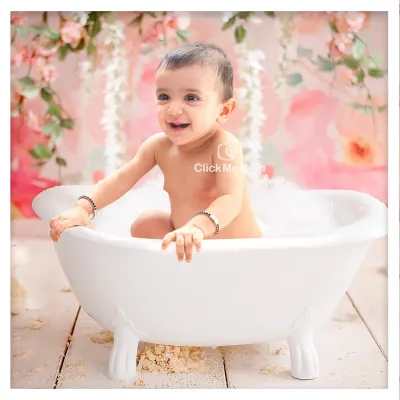 The pure joy of a warm bubble bath. This little one's infectious giggle makes this splash session photo absolutely priceless.