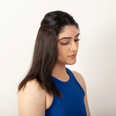A model demonstrating the natural blend of a hair topper. This before-and-after style shot is crucial for showing product effectiveness.