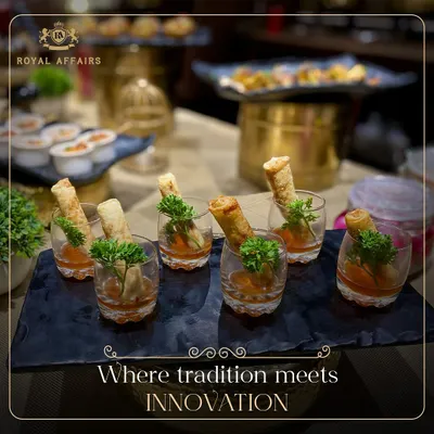 I combine tradition with innovation in my appetizer creations. These spring rolls are served in individual shot glasses with sweet chili sauce, a modern presentation that is both elegant and practical.