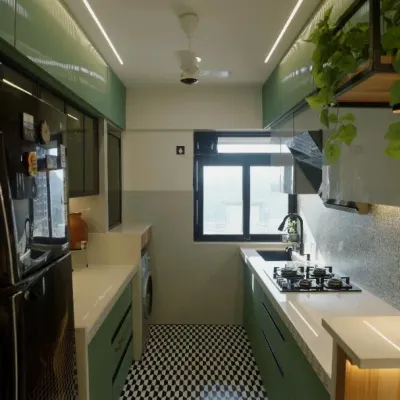 A stunning open-plan kitchen featuring sage green cabinetry, a breakfast bar with a wooden finish, and a striking checkered floor. The overhead unit with integrated planters brings a touch of nature indoors.