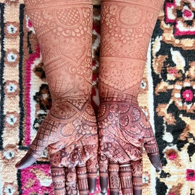 The beautiful, rich brown stain of a full bridal-style henna design after 48 hours.