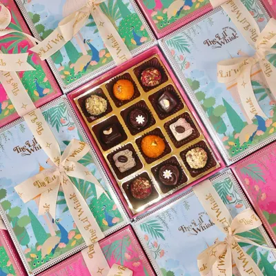 Our Peacock Paradise assorted sweets boxes ready for Diwali. Each box is filled with a variety of our signature Indian fusion sweets like Motichoor, Pistachio, and Rose Gulkand truffles.